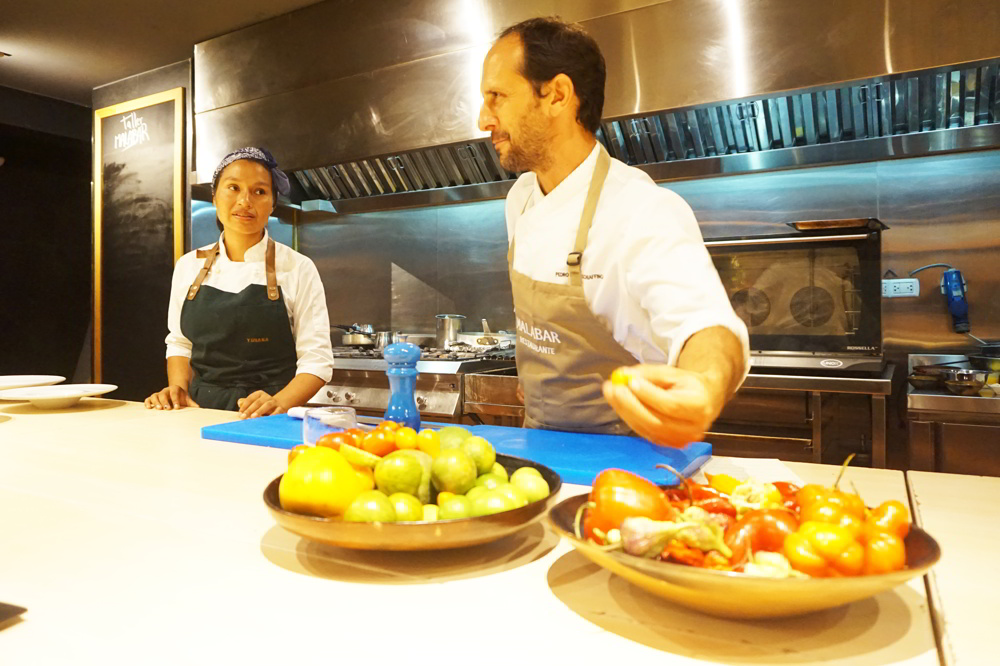 Pedro showing us some chillis