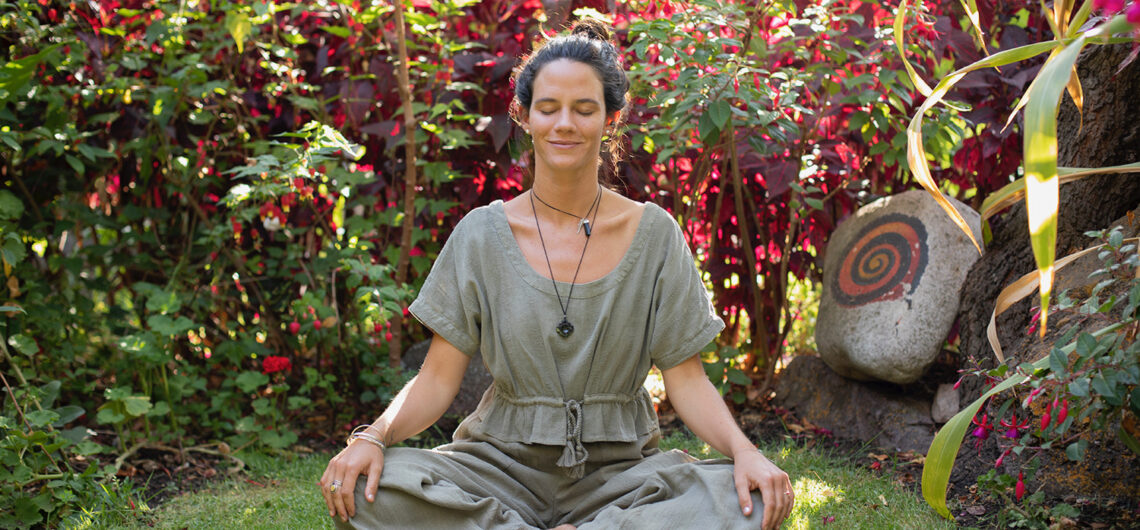 woman practicing yoga during sound ceremony