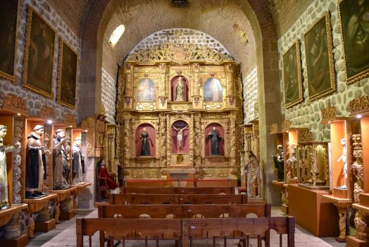 Ornately decorated gold shrine in the chapel of the Casa Real de la Moneda museum (mint house) in Potosi, Bolivia