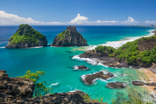 Wide angle shot of baía dos porcos and Cacimba do Padre in Fernando de Noronha Brazil.